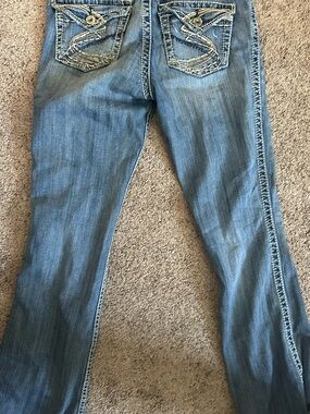 Silver Jeans Medium Blue Bootcut Jeans with Embroidered Back Pockets